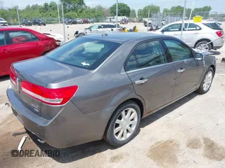 2012 Lincoln MKZ with VIN 3LNHL2JC9CR816557, listed as a IAAI auction lot 42558157 with 203,284 mi miles and . Bid and sale history available at DreamBid. Image 4.