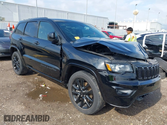 2021 Jeep Grand Cherokee Laredo E with VIN 1C4RJEAG0MC571375, listed as a IAAI auction lot 42087648 with 29,358 mi miles and . Bid and sale history available at DreamBid. Image 1.