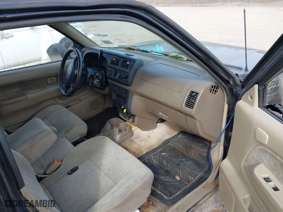 2000 Nissan Frontier 2WD XE with VIN 1N6DD26S1YC307758, listed as a IAAI auction lot 41902443 with 76,560 mi miles. Bid and sale history available at carsss.com. Image 5.