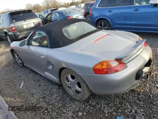 2000 Porsche Boxster z VIN WP0CA2980YU626179, wystawiony jako Copart lot #44728325 z przebiegiem 103 173 mil mil oraz Szkody całkowita. Historia ofert i sprzedaży dostępna na DreamBid. Obrazek 2.