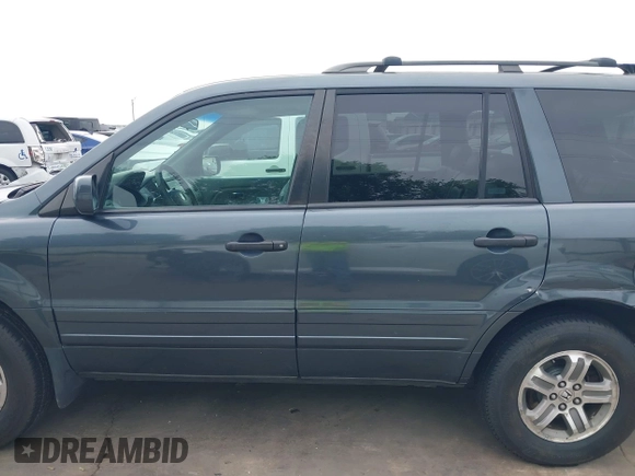 2005 Honda Pilot EX-L with VIN 5FNYF18565B046464, listed as a IAAI auction lot 41879495 with 228,021 mi miles. Bid and sale history available at carsss.com. Image 15.