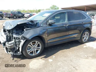 2015 Ford Edge Titanium z VIN 2FMPK4K83FBB30411, wystawiony jako IAAI lot #42230235 z przebiegiem 69 094 mil mil oraz . Historia ofert i sprzedaży dostępna na DreamBid. Obrazek 18.