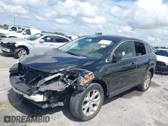 2012 Mazda CX-9 Touring with VIN JM3TB3CV1C0338681, listed as a IAAI auction lot 40458498 with 128,665 mi miles and . Bid and sale history available at DreamBid. Image 6.
