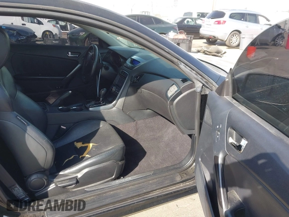 2012 Hyundai Genesis Coupe Grand Touring with VIN KMHHU6KH8CU068486, listed as a IAAI auction lot 41686499 with 104,579 mi miles and . Bid and sale history available at DreamBid. Image 5.