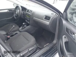 2015 Volkswagen Jetta SE z VIN 3VWD17AJ8FM321933, wystawiony jako IAAI lot #41177805 z przebiegiem 125 987 mil mil oraz . Historia ofert i sprzedaży dostępna na DreamBid. Obrazek 5.