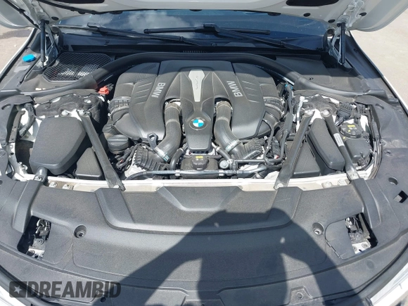 2017 BMW 7 Series 750i with VIN WBA7F0C32HGM22273, listed as a IAAI auction lot 41857151 with 90,518 mi miles and . Bid and sale history available at carsss.com. Image 10.