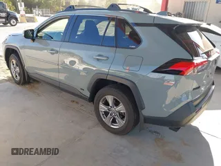 2022 Toyota RAV4 Hybrid XLE with VIN JTMRWRFV9NJ054668, listed as a IAAI auction lot 42606261 with 61,794 mi miles and . Bid and sale history available at DreamBid. Image 3.