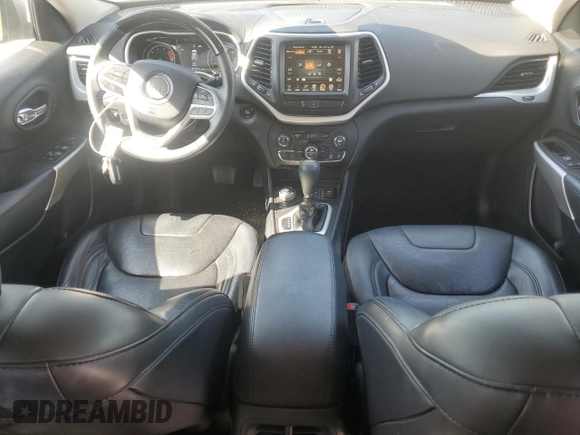 2017 Jeep Cherokee Overland with VIN 1C4PJMJS2HW584851, listed as a Copart auction lot 61738325 with 34,582 mi miles and Salvage title. Bid and sale history available at DreamBid. Image 8.