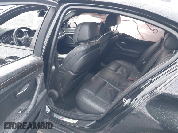 2015 BMW 5 Series 535i with VIN WBA5B1C51FG125924, listed as a IAAI auction lot 41060431 with 102,957 mi miles and . Bid and sale history available at carsss.com. Image 8.