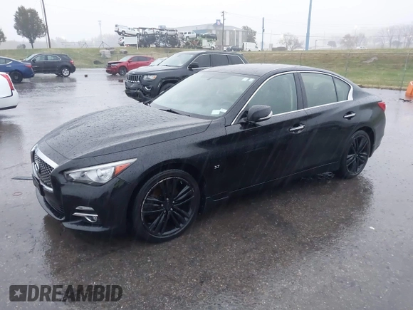 2015 Infiniti Q50 Premium z VIN JN1BV7ARXFM412382, wystawiony jako IAAI lot #40776813 z przebiegiem 66 406 mil mil oraz . Historia ofert i sprzedaży dostępna na DreamBid. Obrazek 17.