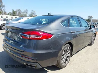 2020 Ford Fusion SE with VIN 3FA6P0T99LR173347, listed as a IAAI auction lot 42090457 with 118,359 mi miles and . Bid and sale history available at DreamBid. Image 4.