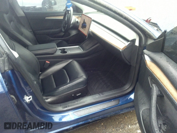 2023 Tesla Model 3 z VIN 5YJ3E1EA4PF576045, wystawiony jako IAAI lot #41565981 z przebiegiem Nie podano mil oraz . Historia ofert i sprzedaży dostępna na DreamBid. Obrazek 5.