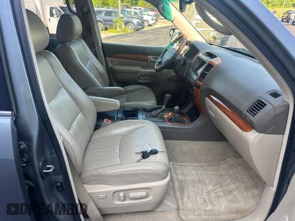 2005 Lexus GX 470 z VIN JTJBT20X050076167, wystawiony jako Copart lot #59916595 z przebiegiem 297 768 mil mil oraz Czysty tytuł • Clean title. Historia ofert i sprzedaży dostępna na DreamBid. Obrazek 5.