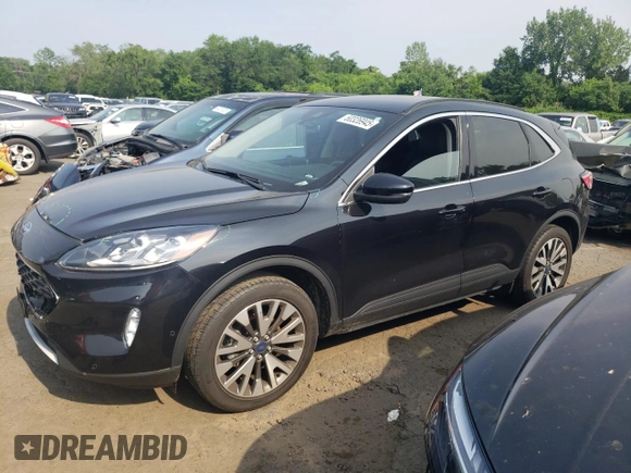 2020 Ford Escape Titanium z VIN 1FMCU9J97LUB25055, wystawiony jako Copart lot #60326945 z przebiegiem 78 711 mil mil oraz Szkoda całkowita • Salvage title. Historia ofert i sprzedaży dostępna na DreamBid. Obrazek 1.