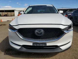 2018 Mazda CX-5 Grand Touring with VIN JM3KFADM5J1350107, listed as a Copart auction lot 50332375 with 110,319 mi miles and Salvage Title. Bid and sale history available at DreamBid. Image 5.