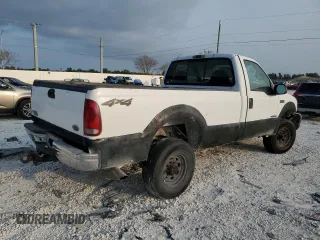 2000 Ford Super Duty F-250 XL with VIN 1FTNF21F7YEA97991, listed as a Copart auction lot 54577544 with 82,036 mi miles and Salvage Title. Bid and sale history available at carsss.com. Image 3.