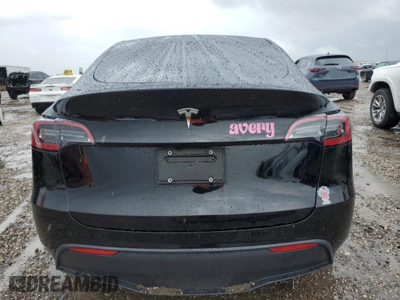 2024 Tesla Model Y z VIN 7SAYGDED7RF018059, wystawiony jako Copart lot #54273785 z przebiegiem 30 080 mil mil oraz Szkoda całkowita • Salvage title. Historia ofert i sprzedaży dostępna na DreamBid. Obrazek 6.