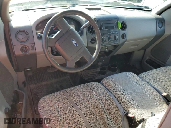 2005 Ford F-150 XL with VIN 1FTRF14W65NB91606, listed as a Copart auction lot 84889894 with 157,947 mi miles and Salvage Title. Bid and sale history available at carsss.com. Image 8.