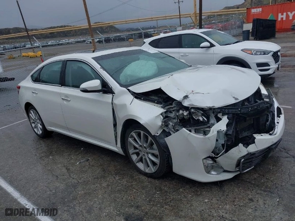 2014 Toyota Avalon Limited with VIN 4T1BK1EB0EU096498, listed as a IAAI auction lot 41767311 with 146,654 mi miles. Bid and sale history available at carsss.com. Image 1.