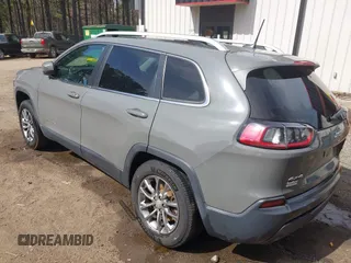2020 Jeep Cherokee Latitude Plus with VIN 1C4PJMLB1LD608591, listed as a IAAI auction lot 41833275 with 90,838 mi miles and . Bid and sale history available at DreamBid. Image 3.