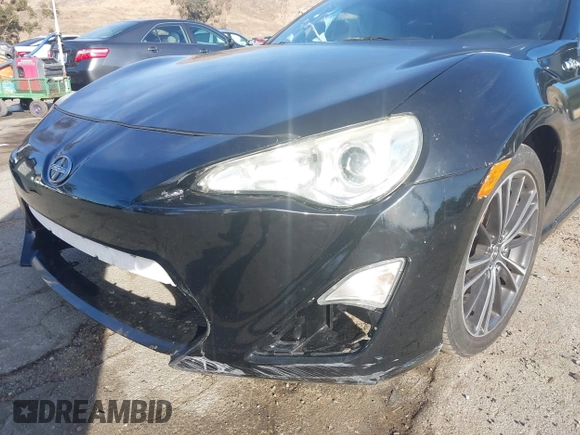 2015 Scion FR-S z VIN JF1ZNAA14F9703780, wystawiony jako IAAI lot #41493648 z przebiegiem 125 997 mil mil oraz . Historia ofert i sprzedaży dostępna na DreamBid. Obrazek 6.