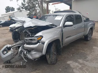 2023 Toyota Tacoma SR5 z VIN 3TMDZ5BN2PM164497, wystawiony jako IAAI lot #42034519 z przebiegiem 25 451 mil mil oraz . Historia ofert i sprzedaży dostępna na DreamBid. Obrazek 2.