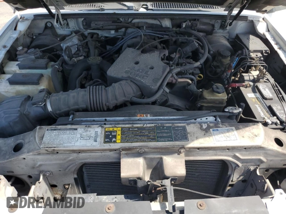 2002 Ford Explorer Sport Trac Value with VIN 1FMZU67E42UD15004, listed as a Copart auction lot 54129135 with 129,952 mi miles and Salvage title. Bid and sale history available at DreamBid. Image 11.
