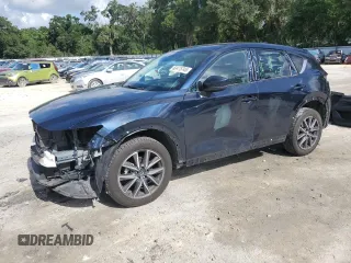 2018 Mazda CX-5 Grand Touring with VIN JM3KFBDMXJ0350499, listed as a Copart auction lot 63475745 with 119,642 mi miles and Salvage title. Bid and sale history available at DreamBid. Image 1.