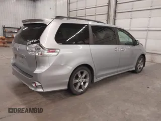 2015 Toyota Sienna SE with VIN 5TDXK3DC9FS527667, listed as a IAAI auction lot 41977729 with 230,933 mi miles and . Bid and sale history available at DreamBid. Image 4.