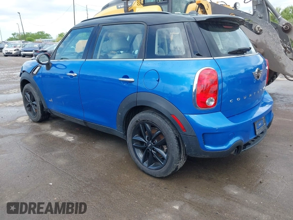 2014 MINI Countryman S with VIN WMWZC5C52EWP38659, listed as a IAAI auction lot 42229976 with 115,229 mi miles and . Bid and sale history available at DreamBid. Image 3.