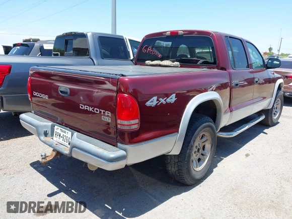 2003 Dodge Dakota SLT with VIN 1D7HG48N43S256520, listed as a IAAI auction lot 42111997 with 218,061 mi miles and . Bid and sale history available at carsss.com. Image 4.