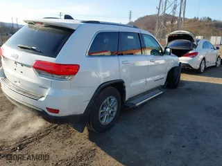 2018 Jeep Grand Cherokee Laredo E with VIN 1C4RJFAG0JC298441, listed as a IAAI auction lot 41748555 with 144,606 mi miles. Bid and sale history available at carsss.com. Image 4.