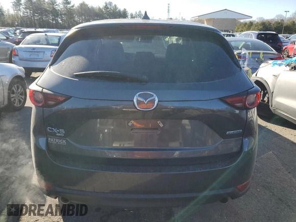 2021 Mazda CX-5 Grand Touring with VIN JM3KFBDM9M0490239, listed as a Copart auction lot 43306975 with 47,010 mi miles and Salvage Title. Bid and sale history available at carsss.com. Image 6.