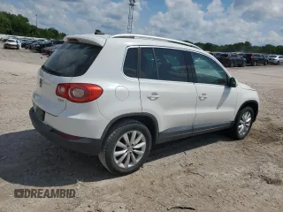 2011 Volkswagen Tiguan SEL w/Premium Navi z VIN WVGAV7AX1BW540155, wystawiony jako Copart lot #56483975 z przebiegiem 137 970 mil mil oraz Czysty tytuł • Clean title. Historia ofert i sprzedaży dostępna na DreamBid. Obrazek 3.