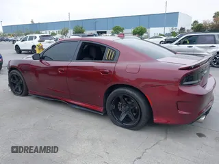 2019 Dodge Charger R/T with VIN 2C3CDXCT2KH749207, listed as a IAAI auction lot 42120658 with 52,330 mi miles and . Bid and sale history available at carsss.com. Image 3.
