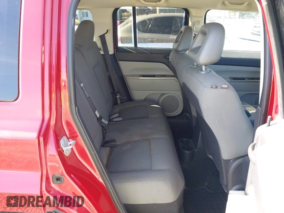 2007 Jeep Patriot Sport with VIN 1J8FT28W77D401093, listed as a IAAI auction lot 41751851 with 143,445 mi miles and . Bid and sale history available at DreamBid. Image 8.