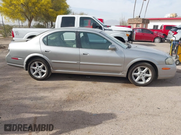 2002 Nissan Maxima GLE z VIN JN1DA31A22T302286, wystawiony jako IAAI lot #41929154 z przebiegiem 249 531 mil mil oraz . Historia ofert i sprzedaży dostępna na DreamBid. Obrazek 13.
