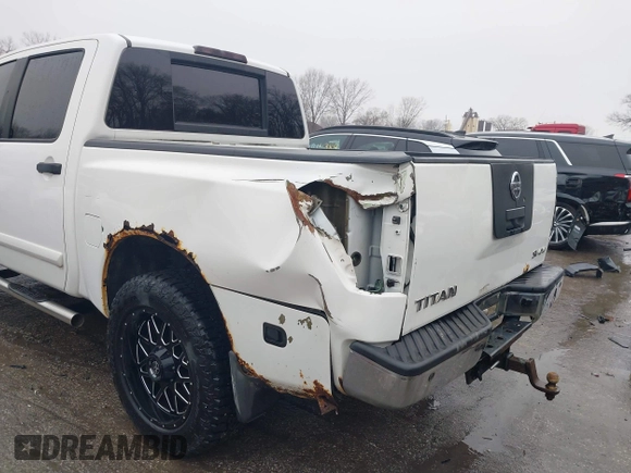2011 Nissan Titan SL with VIN 1N6AA0EC8BN317497, listed as a IAAI auction lot 41443597 with 202,622 mi miles. Bid and sale history available at carsss.com. Image 6.