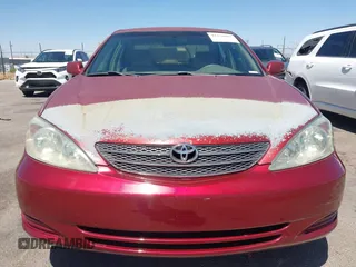 2002 Toyota Camry LE z VIN 4T1BE32K52U082454, wystawiony jako IAAI lot #42276881 z przebiegiem 225 814 mil mil oraz . Historia ofert i sprzedaży dostępna na DreamBid. Obrazek 12.