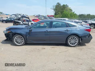 2019 Toyota Avalon XLE z VIN 4T1BZ1FB0KU030278, wystawiony jako IAAI lot #41984852 z przebiegiem 127 165 mil mil oraz . Historia ofert i sprzedaży dostępna na DreamBid. Obrazek 14.