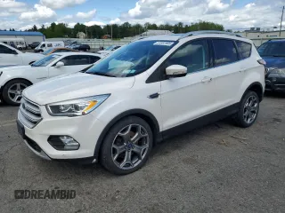 2018 Ford Escape Titanium with VIN 1FMCU9J96JUA40348, listed as a Copart auction lot 57087985 with 114,241 mi miles and Salvage title. Bid and sale history available at DreamBid. Image 1.