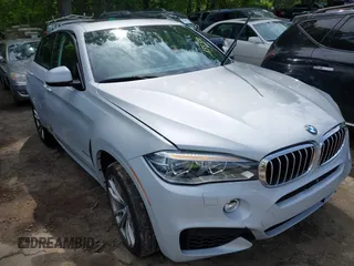 2016 BMW X6 xDrive50i z VIN 5UXKU6C57G0R33572, wystawiony jako IAAI lot #42103956 z przebiegiem 65 520 mil mil oraz . Historia ofert i sprzedaży dostępna na DreamBid. Obrazek 1.