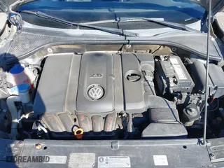 2012 Volkswagen Passat SE with VIN 1VWBP7A31CC008775, listed as a IAAI auction lot 41353437 with 118,815 mi miles. Bid and sale history available at carsss.com. Image 10.