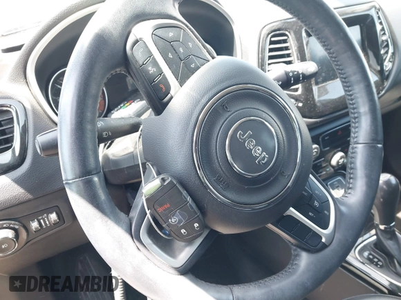 2018 Jeep Compass Latitude with VIN 3C4NJDBB3JT304145, listed as a IAAI auction lot 42008241 with 52,642 mi miles and . Bid and sale history available at DreamBid. Image 11.