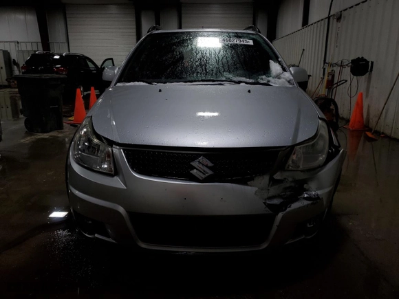 2011 Suzuki SX4 Crossover with VIN JS2YB5A39B6303044, listed as a Copart auction lot 46027945 with 111,435 mi miles and Salvage Title. Bid and sale history available at carsss.com. Image 5.