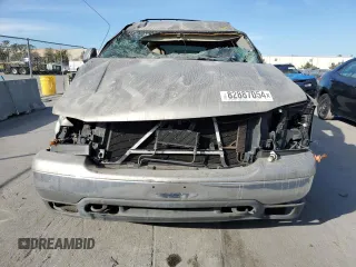 2000 GMC Yukon SLE with VIN 1GKEK13T2YJ130870, listed as a Copart auction lot 82887054 with 310,765 mi miles and Salvage Title. Bid and sale history available at carsss.com. Image 5.