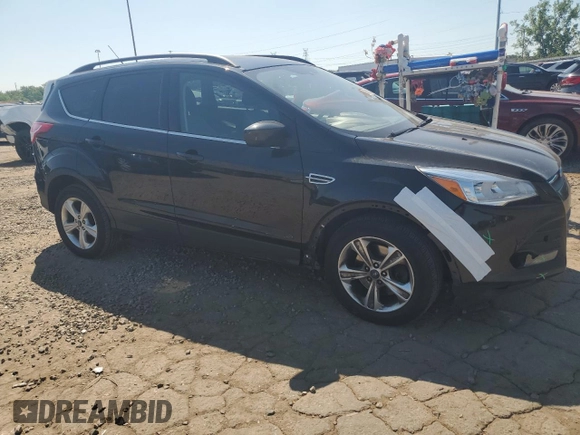 2014 Ford Escape SE with VIN 1FMCU9GX1EUD71589, listed as a Copart auction lot 63191785 with 112,579 mi miles and Clean title. Bid and sale history available at DreamBid. Image 4.