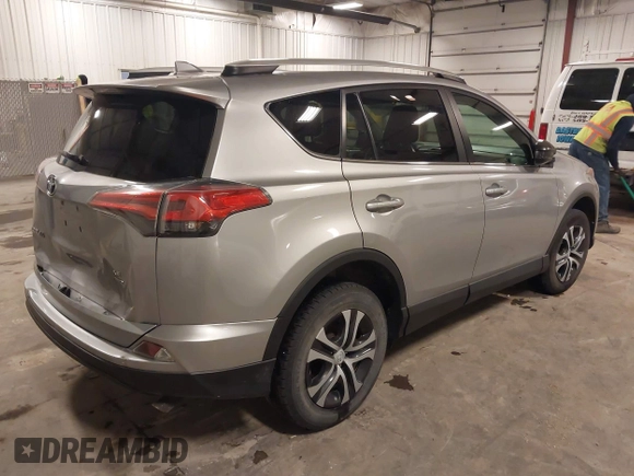 2016 Toyota RAV4 LE with VIN 2T3BFREV8GW509257, listed as a IAAI auction lot 41807349 with 216,031 mi miles. Bid and sale history available at carsss.com. Image 4.