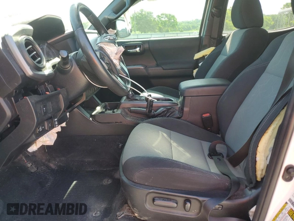 2020 Toyota Tacoma SR5 with VIN 3TMCZ5AN9LM296891, listed as a Copart auction lot 56047625 with 74,301 mi miles and Salvage title. Bid and sale history available at DreamBid. Image 7.