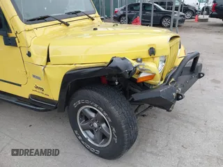 2004 Jeep Wrangler X with VIN 1J4FA39S74P726202, listed as a IAAI auction lot 41613170 with 120,319 mi miles and . Bid and sale history available at DreamBid. Image 6.